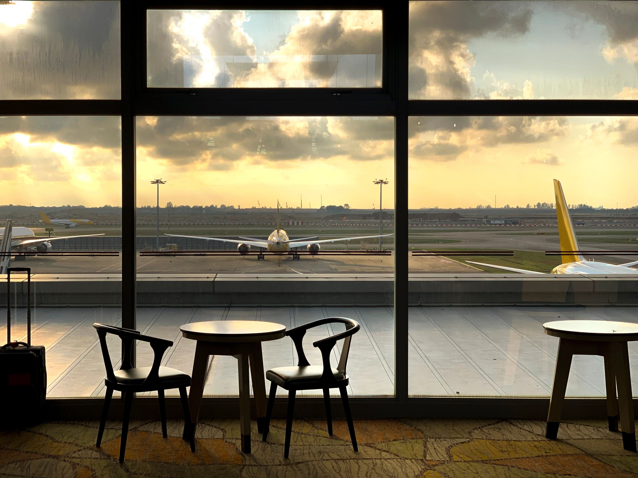 Airport terminal at dusk for chauffeur transfer journeys